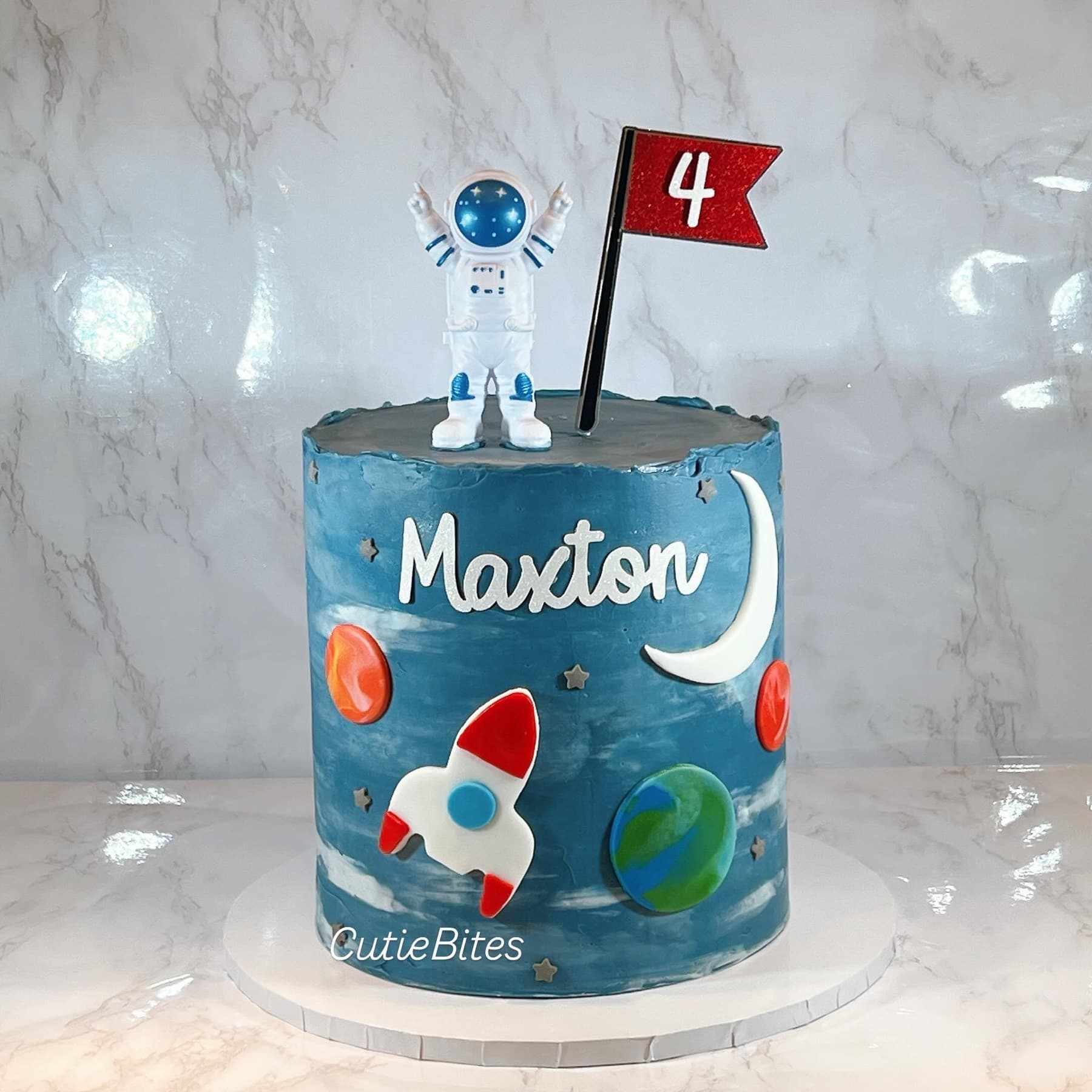 Astronaut space birthday cake with rocket, planets and moon — Cutie Bites, Orpington