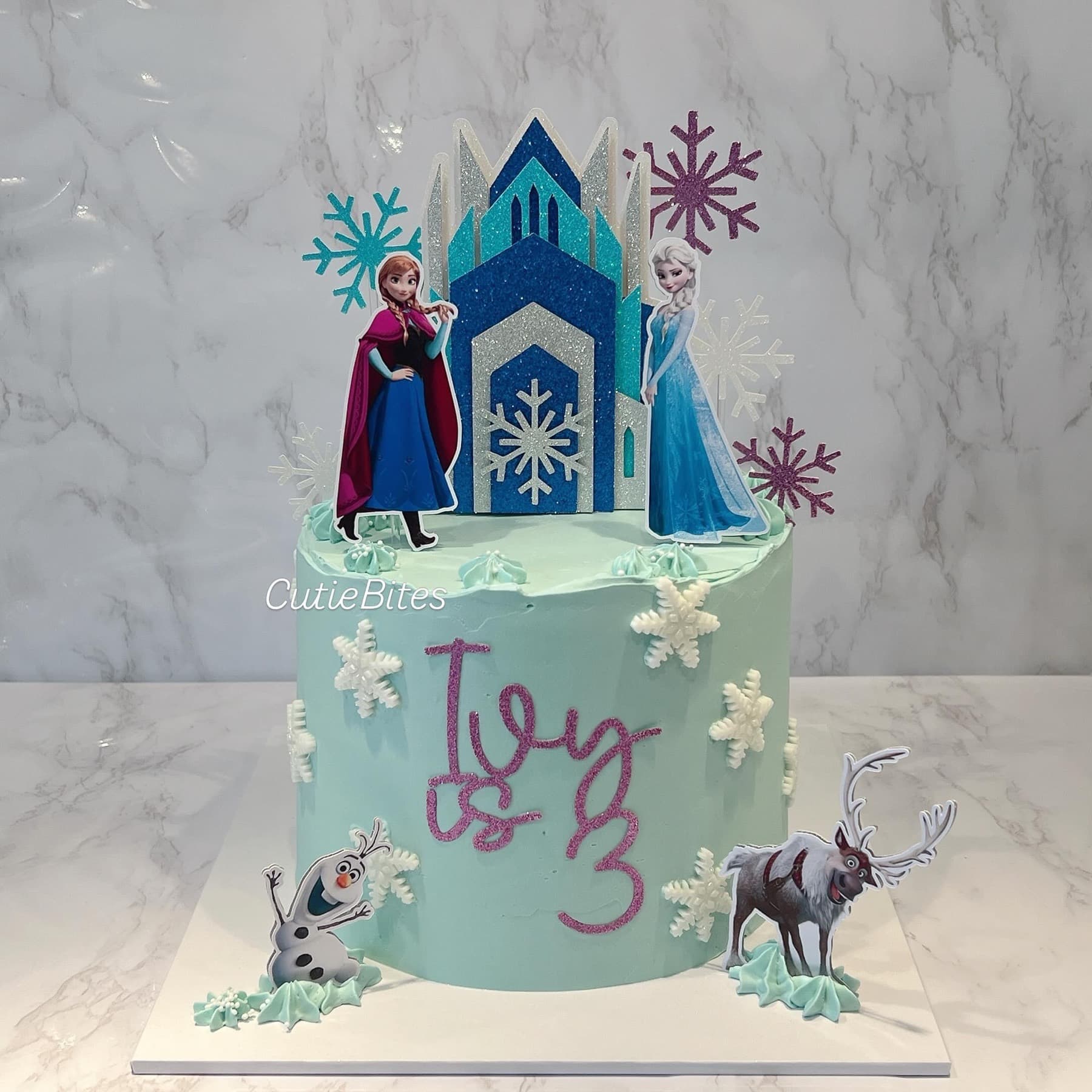 Frozen birthday cake with Anna, Elsa, ice castle, Olaf and Sven — Cutie Bites, Orpington