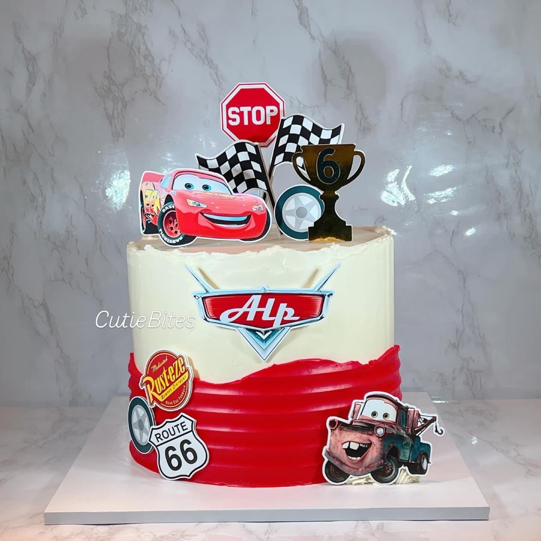 Lightning McQueen Cars birthday cake with Mater, checkered flags and Route 66 — Cutie Bites, Orpington