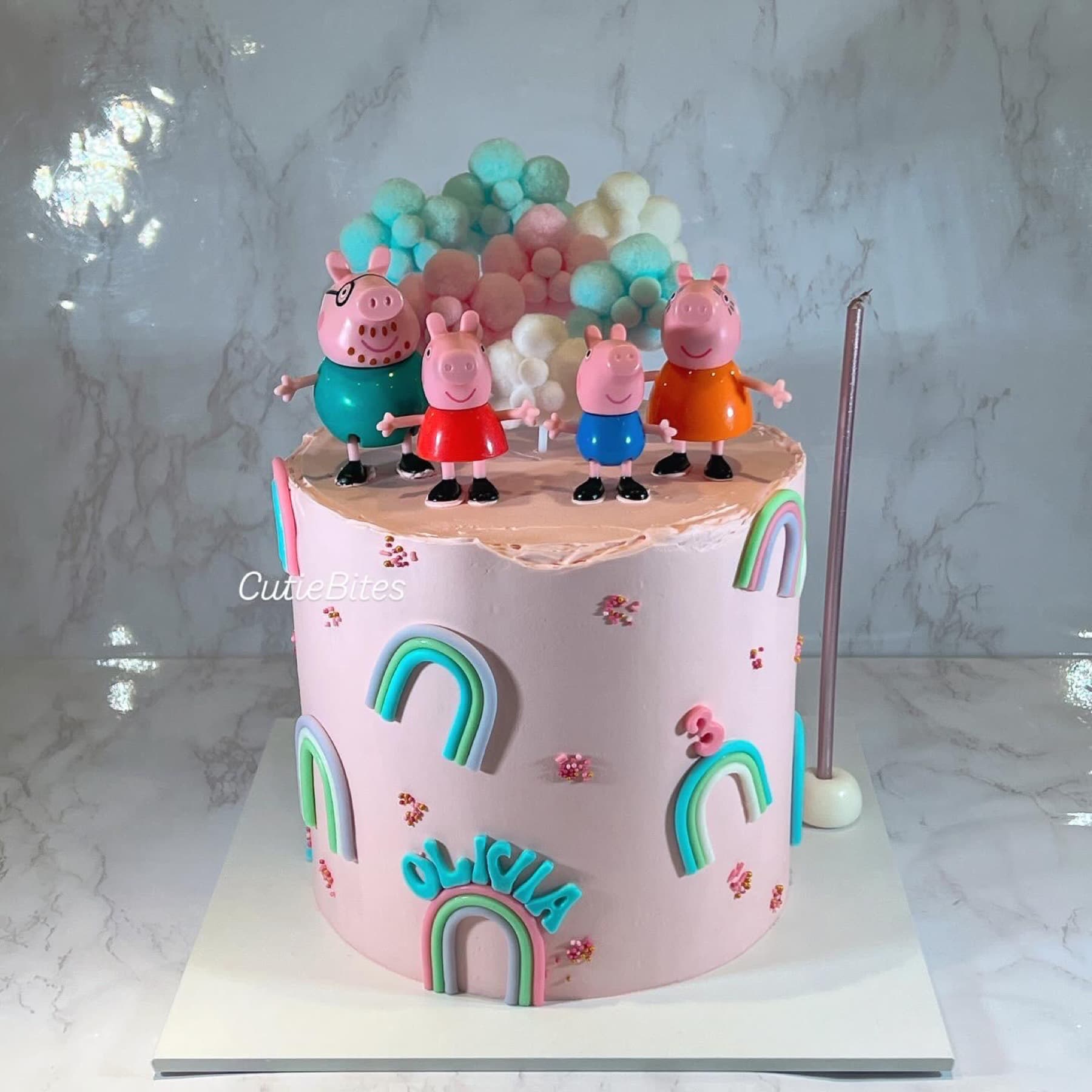 Pink Peppa Pig rainbow birthday cake with family toppers and pom-pom clouds — Cutie Bites, Orpington