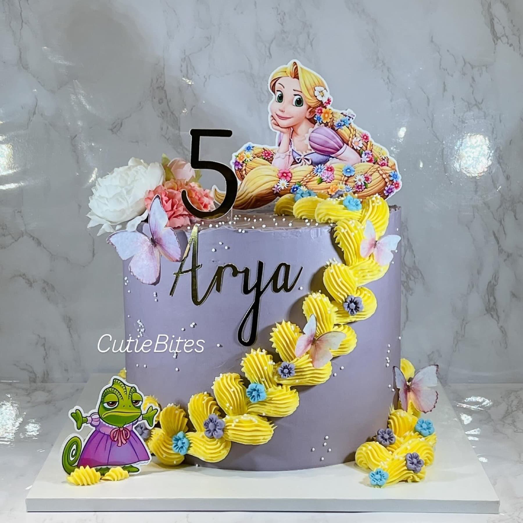 Rapunzel Tangled birthday cake with buttercream braid, flowers and Pascal — Cutie Bites, Orpington