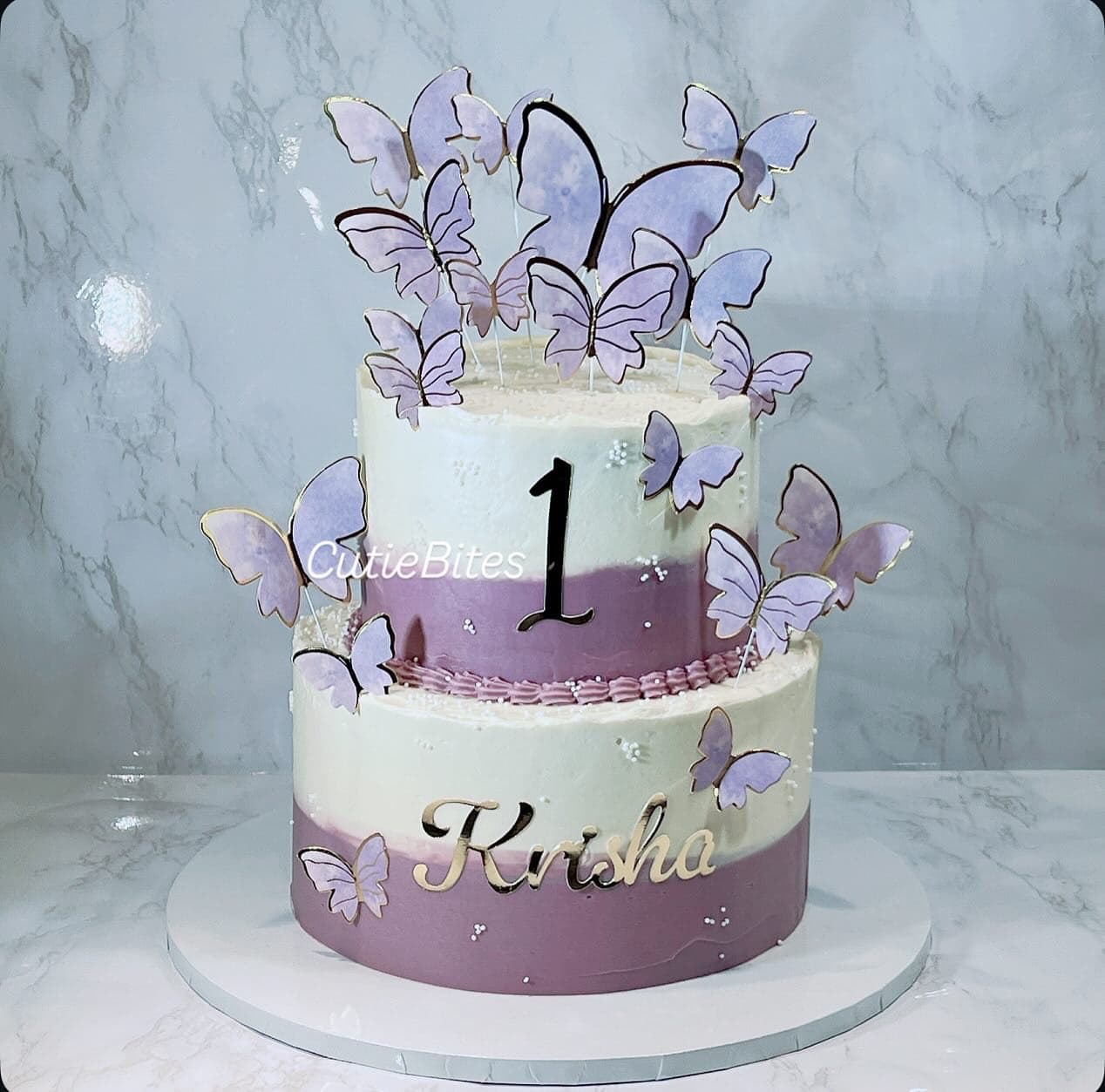 Lavender butterfly garden cake with textured buttercream